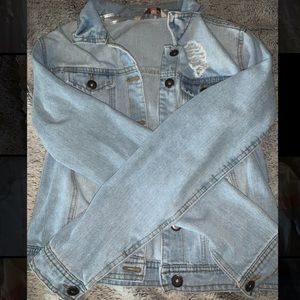 Distressed light blue jean jacket